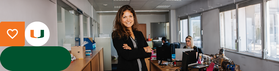 A woman is looking at the camara and smiling